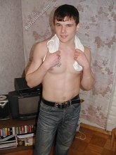 Tatted-up twink shows off in front of a camera