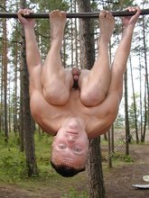 Gymnast twink showing his strength and his asshole