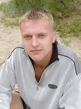 Blond-haired beauty showing off on a beach