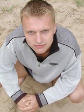 Blond-haired beauty showing off on a beach