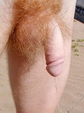 Redheaded seductive twink shows off his cock