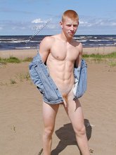 Redheaded seductive twink shows off his cock