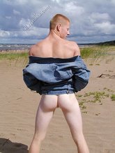 Redheaded seductive twink shows off his cock