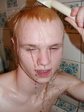 Blond-haired twink showering and showing off