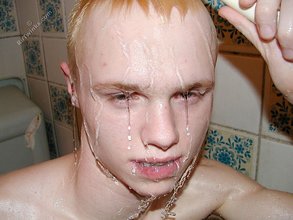 Blond-haired twink showering and showing off