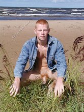 Jacked-up twink in a denim jacket shows his hot ass