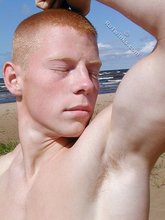 Jacked-up twink in a denim jacket shows his hot ass