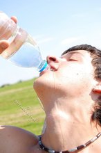 Slender twink drinking water and looking sexy