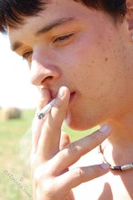Smoking hot twink decides to take his shirt off