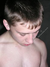 Dark-haired twink shows his unimpressive dick