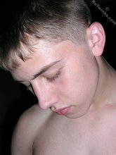 Dark-haired twink shows his unimpressive dick