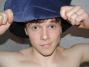 Horny-looking boy striking goofy poses on camera