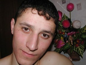 Dark-haired young boy shows his wonderful cock