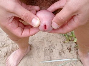 Blond-haired twink hottie posing naked outdoors