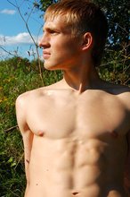 Jacked-up dude flashing his perfect body outdoors