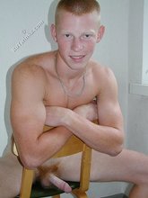 Tanned redheaded twink shows his pubes and more