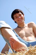 Horny-looking country boy shows his shirtless bod