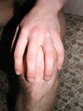 Tatted-up twink with a hairy cock showing his body