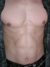 Twink pops his shirt open to expose his sexy abs