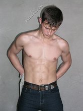 Twink pops his shirt open to expose his sexy abs