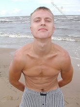Blond-haired twink flashing his sexy junk on cam