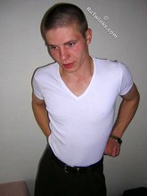 Kinky bald-headed twink putting his clothes back on