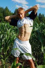Shredded young boy shows off his beautiful abs