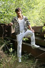 Dark-haired young boy shows off his ass and then some