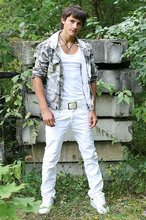 Dark-haired young boy shows off his ass and then some