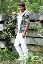 Dark-haired young boy shows off his ass and then some