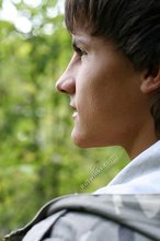 Dark-haired young boy shows off his ass and then some