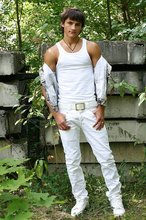 Dark-haired young boy shows off his ass and then some