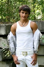 Dark-haired young boy shows off his ass and then some