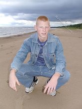 Muscly redheaded twink posing by the river