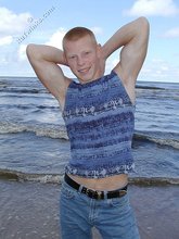 Muscly redheaded twink posing by the river