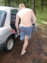 Jacked-up twink doing pull-ups and posing seductively