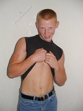 Shirtless posing session from a redheaded twink