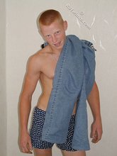 Shirtless posing session from a redheaded twink