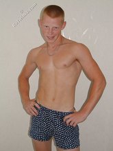 Shirtless posing session from a redheaded twink