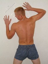 Shirtless posing session from a redheaded twink