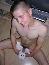 Buzzcut twink showing his cock and fucking stuffed toys