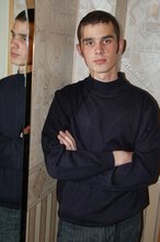 Twink with killer sideburns shows off his fave t-shirt