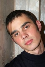 Twink with killer sideburns shows off his fave t-shirt
