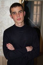 Twink with killer sideburns shows off his fave t-shirt