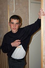 Twink with killer sideburns shows off his fave t-shirt