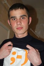 Twink with killer sideburns shows off his fave t-shirt