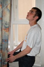 Twink with killer sideburns shows off his fave t-shirt