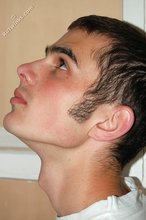 Twink with killer sideburns shows off his fave t-shirt