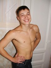 Shredded stud posing and smiling like a lunatic