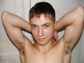 Shredded stud posing and smiling like a lunatic
